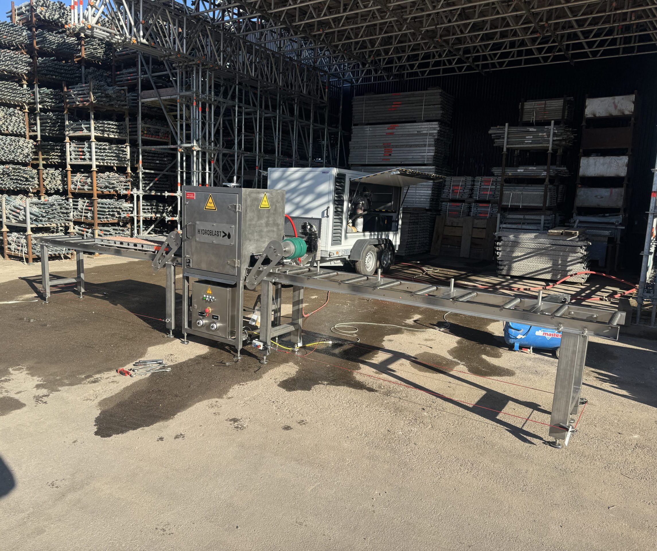 IMG_7911-scaled-e1742204513690 Flowplant DTK Harben Trailer In Use With A Man in PPE